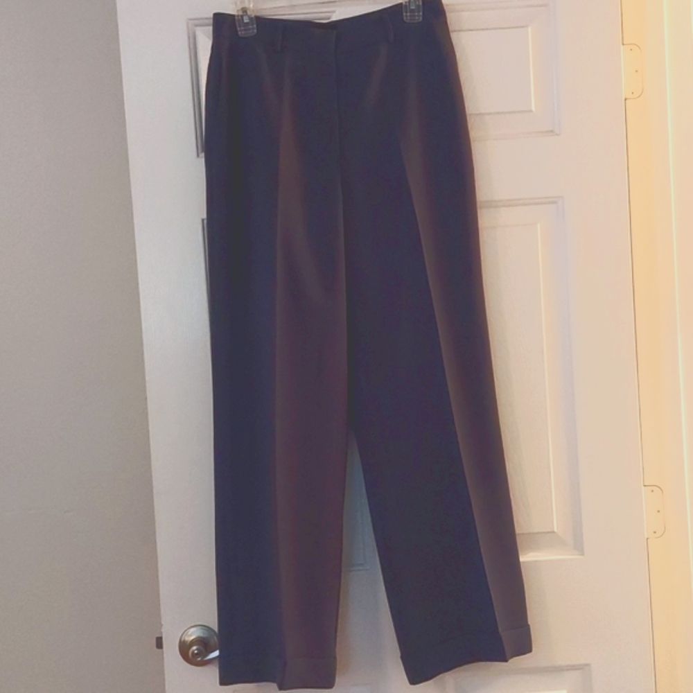Fully lined and cuffed Teal Colored trousers.